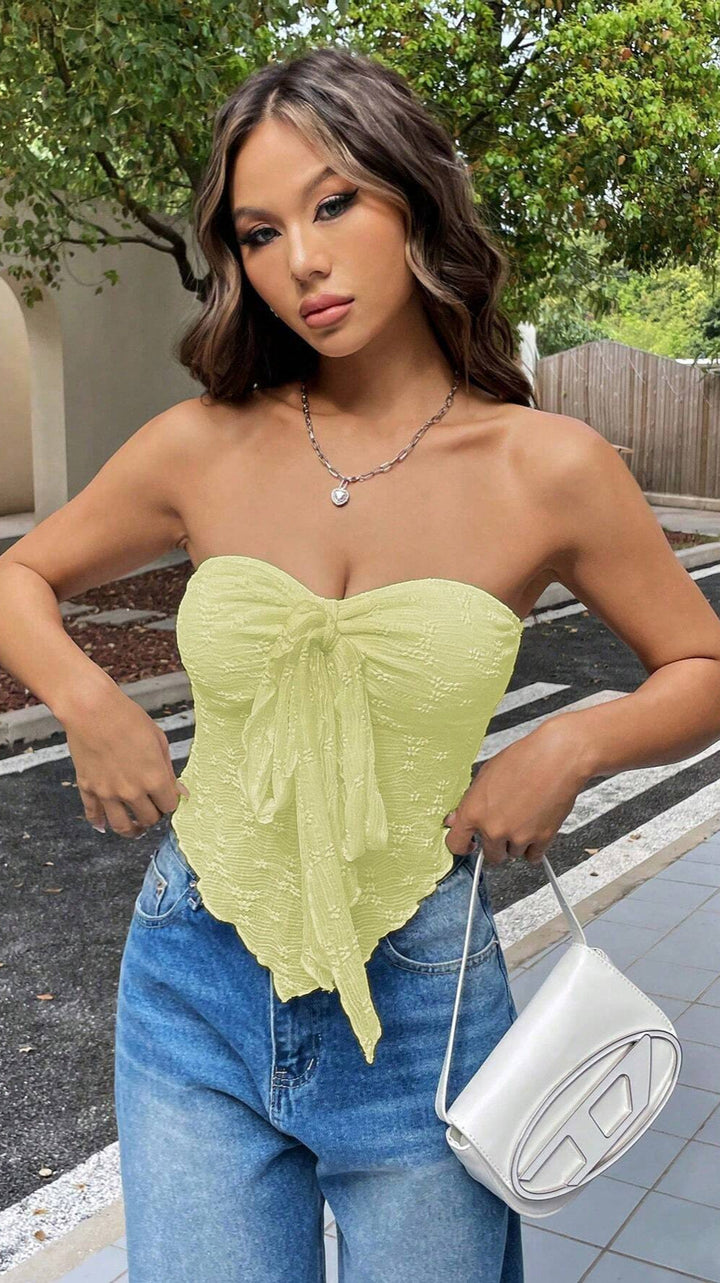 Stropløs top med sløjfedetalje og blondestruktur