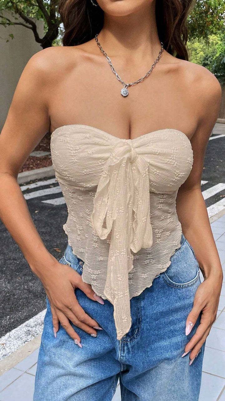 Stropløs top med sløjfedetalje og blondestruktur