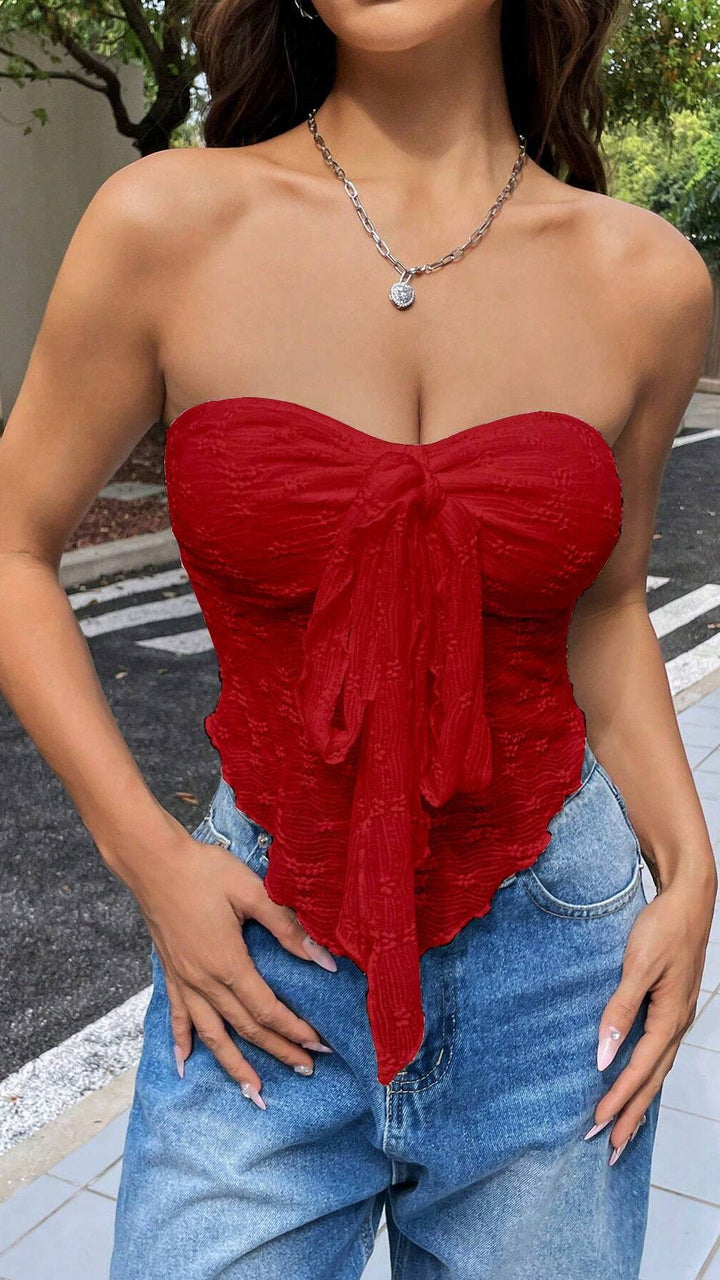 Stropløs top med sløjfedetalje og blondestruktur