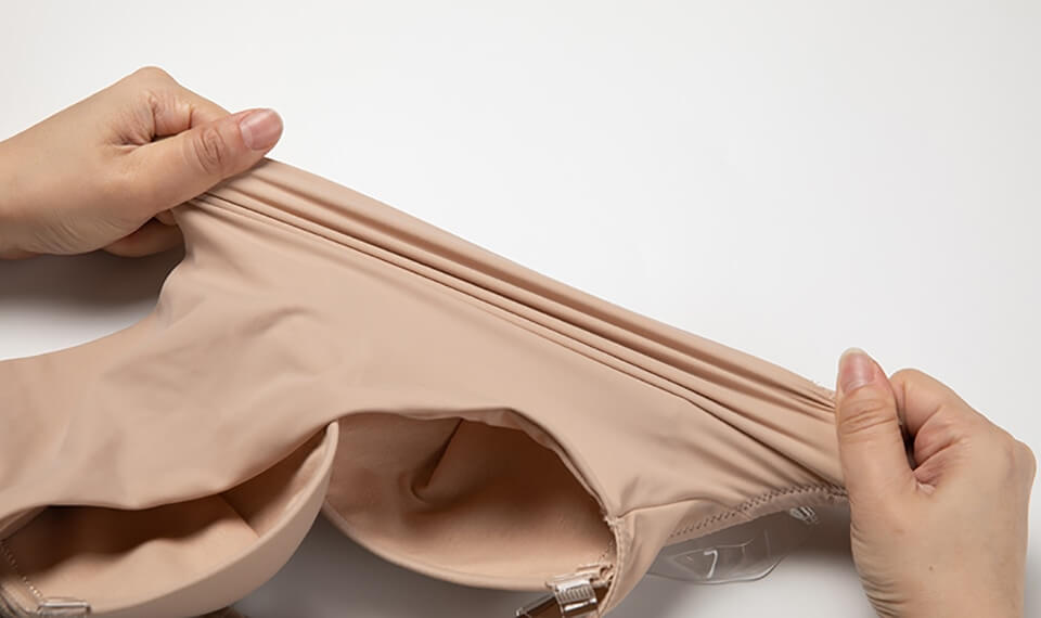 Body shaper med dyb V-udskæring og rygfri design i seamless stil