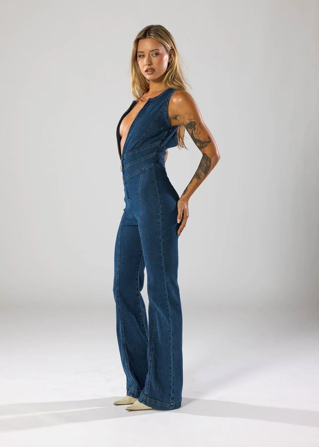 Denim Jumpsuit with Deep V-neck and Flare